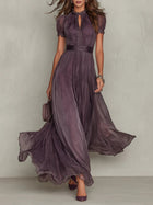 Flowing Pleated High-Neck Maxi Dress